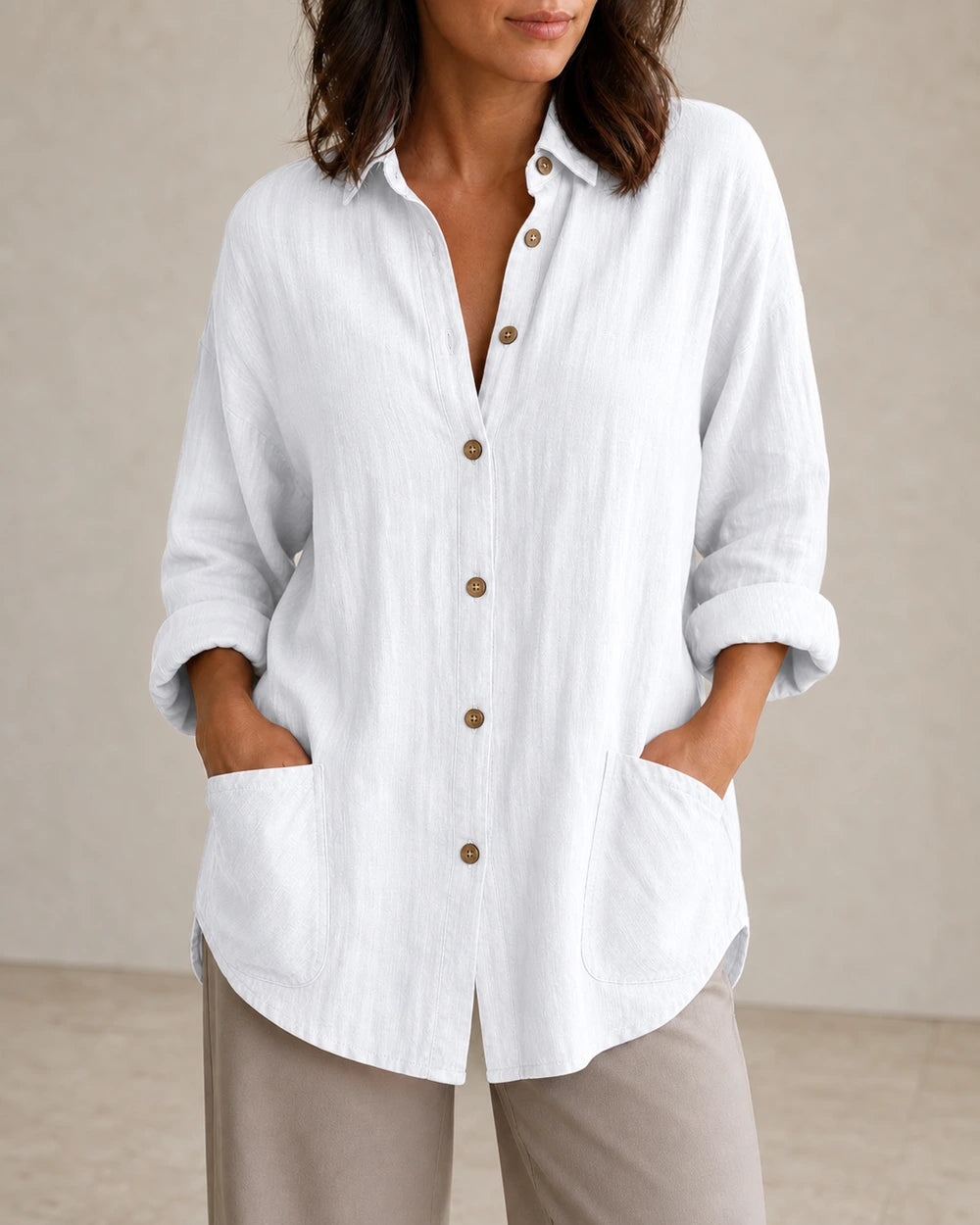 Women's white relaxed longline shirt, front product view.