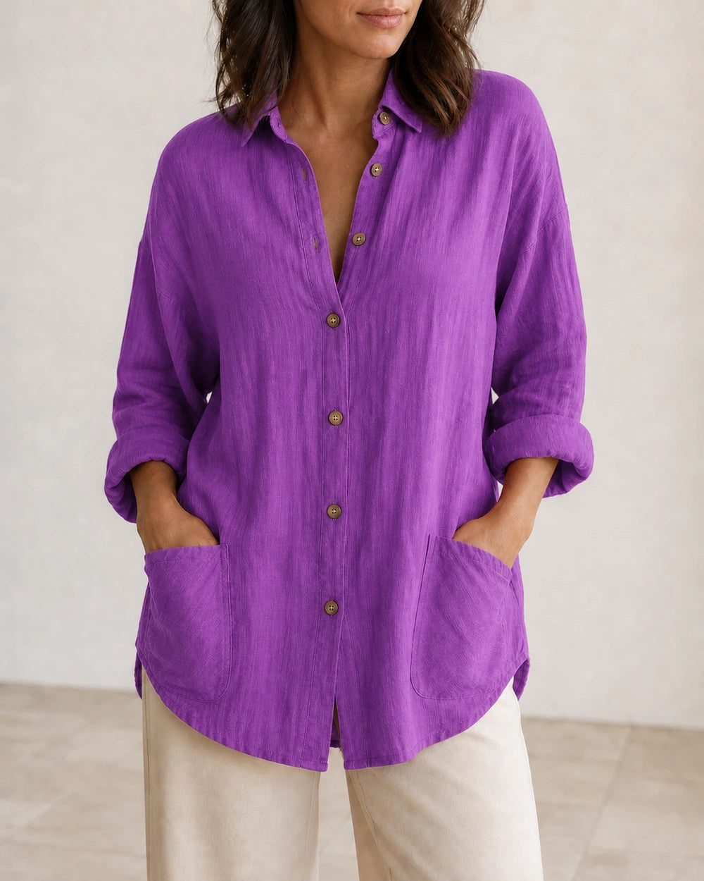 Women's purple relaxed longline shirt, front product view.