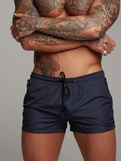 Sorte herrebadeshorts – Slim silhuet med snor og mellemlangt snit
