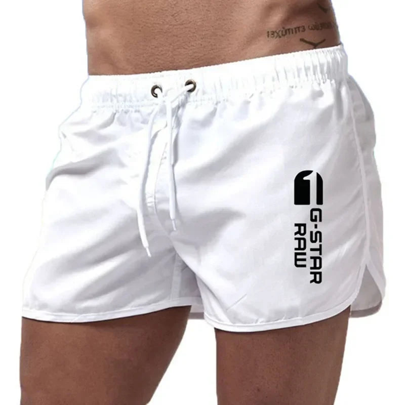 Ensfarvede herrebadeshorts – Slim fit, hurtigtørrende og elastisk