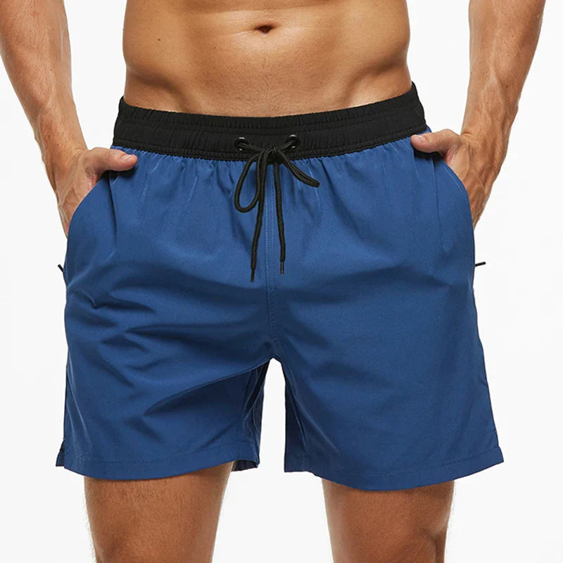 Blå herrebadeshorts – Mesh-foer, sidelommer og elastisk linning