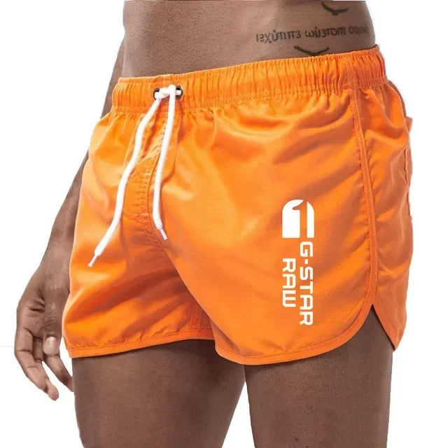 Ensfarvede herrebadeshorts – Slim fit, hurtigtørrende og elastisk