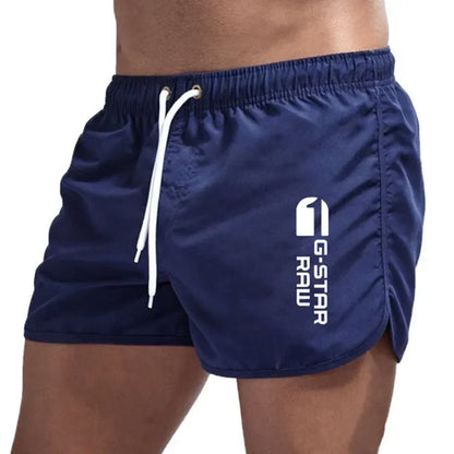 Ensfarvede herrebadeshorts – Slim fit, hurtigtørrende og elastisk