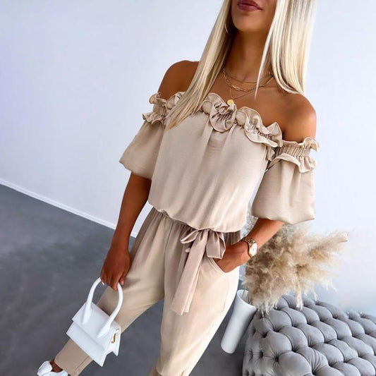 Damebuksedragt – off-shoulder med snørebånd i taljen og flæser