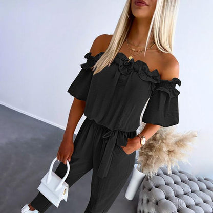 Damebuksedragt – off-shoulder med snørebånd i taljen og flæser