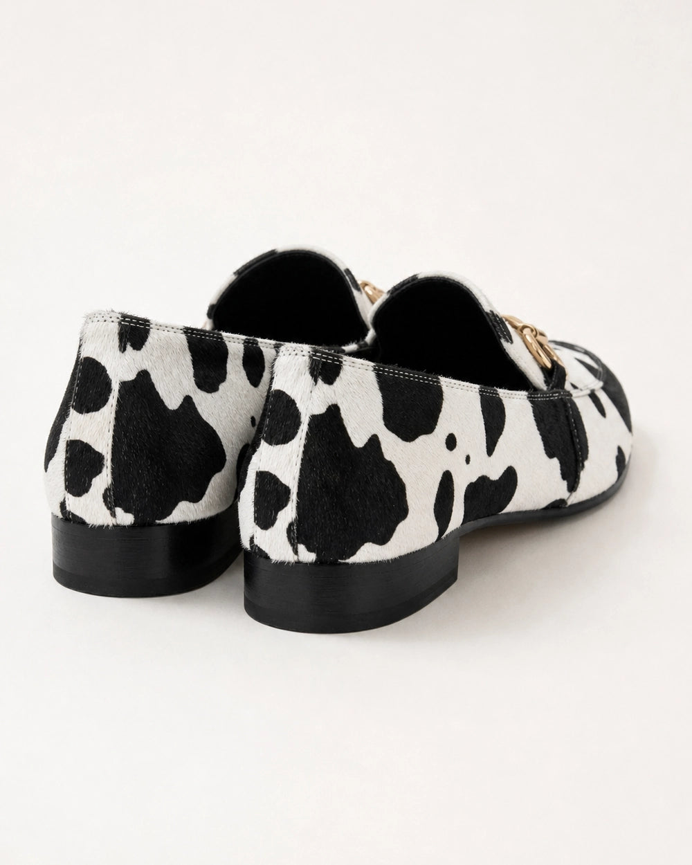 OCTAVIA-QUALITY-REMAKE-2026-07-22 — loafers-for-women-animal-print-slip-on-black-white-04-rear-proof.webp