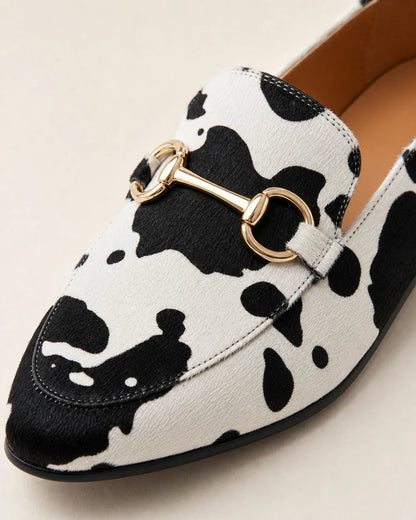 OCTAVIA-QUALITY-REMAKE-2026-07-22 — loafers-for-women-animal-print-slip-on-black-white-05-hardware-detail.webp