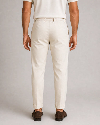 Men's beige relaxed summer pants, true rear view.