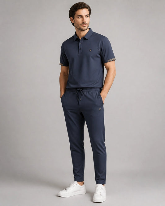 Blue men's polo and trousers set worn, product hero.