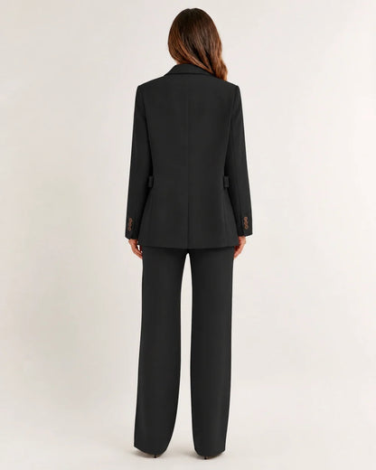 Black relaxed blazer and wide-leg trousers set for women, back view